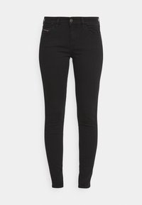 Pantalones vaqueros ajustados negros fabricados con una mezcla de algodón, que presentan un diseño clásico de cinco bolsillos y sutiles detalles de costura en los bolsillos.