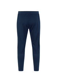 Marineblauwe sportbroek met een aansluitend ontwerp, elastische tailleband en gladde stof. Heeft taps toelopende pijpen en geen zichtbare patronen of accenten.
