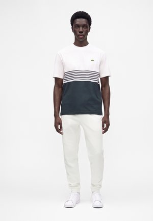 Lacoste, UNISEX - Pantalon de survêtement - flour