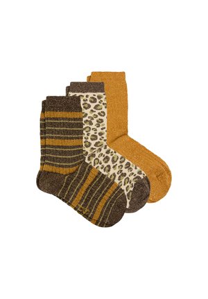 Tres pares de calcetines brillantes, uno de color dorado sólido, uno con estampado de leopardo en crema y marrón, y uno a rayas en tonos marrón, dorado y verde.