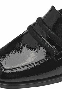 Scarpa in pelle verniciata nera con una finitura liscia e lucida, caratterizzata da una vasta striscia in Velcro sulla parte superiore per una facile chiusura e un comfort extra.