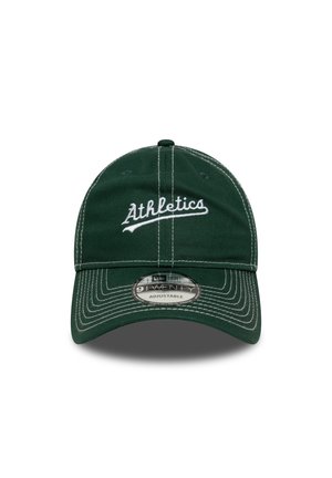 Green baseball cap with white "Athletics" embroidery, adjustable strap, structured crown, and contrasting stitching details.