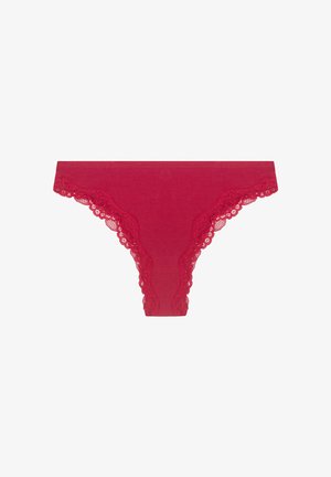 Red lace-trimmed thong, featuring a smooth fabric body with scalloped edges and a curved silhouette. Soft texture for comfort.