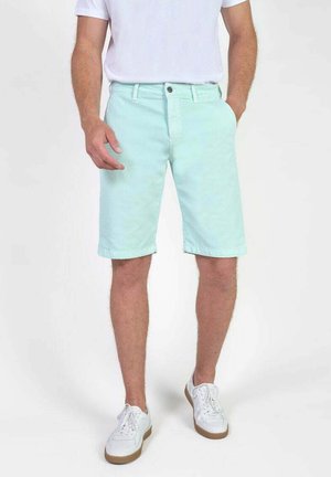 Light mint green shorts made from cotton, featuring a straight cut, belt loops, front pockets, and a single button closure.