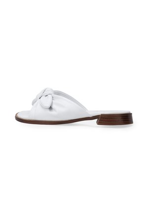 White leather slide sandal featuring a knotted strap design, open toe, and a low wooden heel. Smooth texture with minimalist style.