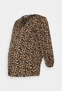 Top de maternidade com estampa de leopardo, apresentando um decote em V, mangas puff até ao cotovelo e um corte solto. Confeccionado em tecido leve e texturizado.
