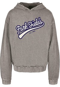 Szara bluza z kapturem o skróconym kroju. Zawiera logo "Park Fields" w białym i granatowym kolorze, założona w 1961 roku. Miękka faktura i długie rękawy.