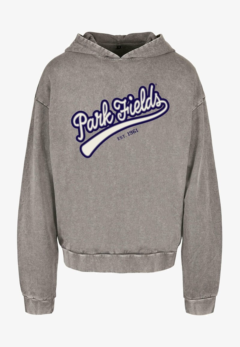 Sweatshirt à capuche gris au design court. Présente le logo "Park Fields" en blanc et marine, établi en 1961. Texture douce et manches longues.