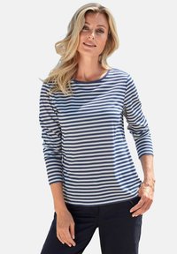 Gestreepte lange mouwen shirt in marineblauw en lichtblauw. Zachte stof, ronde halslijn en losse fit, met horizontale strepen en omslagmouwen.