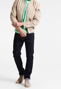 Tommy Hilfiger Triko s potiskem - mint