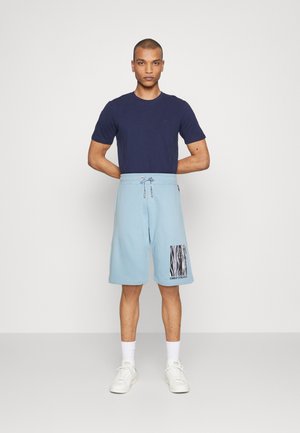 UNISEX - Tracksuit bottoms - blau