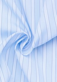 Light blue fabric with white and darker blue vertical stripes. The material appears smooth and flowing, showcasing a soft texture.