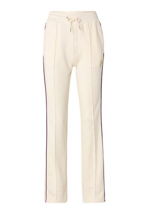 Crème kleurige jogger broek met een subtiel logopatroon, voorzien van paarse zijstrepen en een elastische tailleband met trekkoorden.