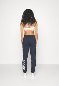 adidas Sportswear ESSENTIALS LINEAR CUFFED - Træningsbukser - legend ink