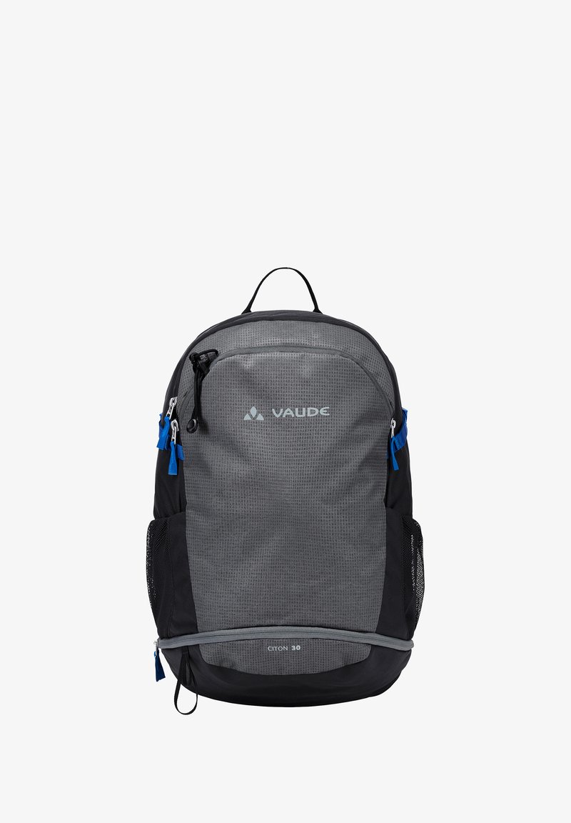 Sac à dos en tissu gris avec des accents noirs, doté de poches zippées, de poches latérales en mesh et de tirettes de fermeture éclair bleues. Nom du modèle "CITON 30."