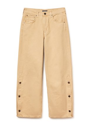Beige broek met wijde pijpen, voorzakken, lussen voor een ceintuur, knoop- en ritssluiting, en met een knoopsluiting aan de zijkanten van de zoom bij beide benen.