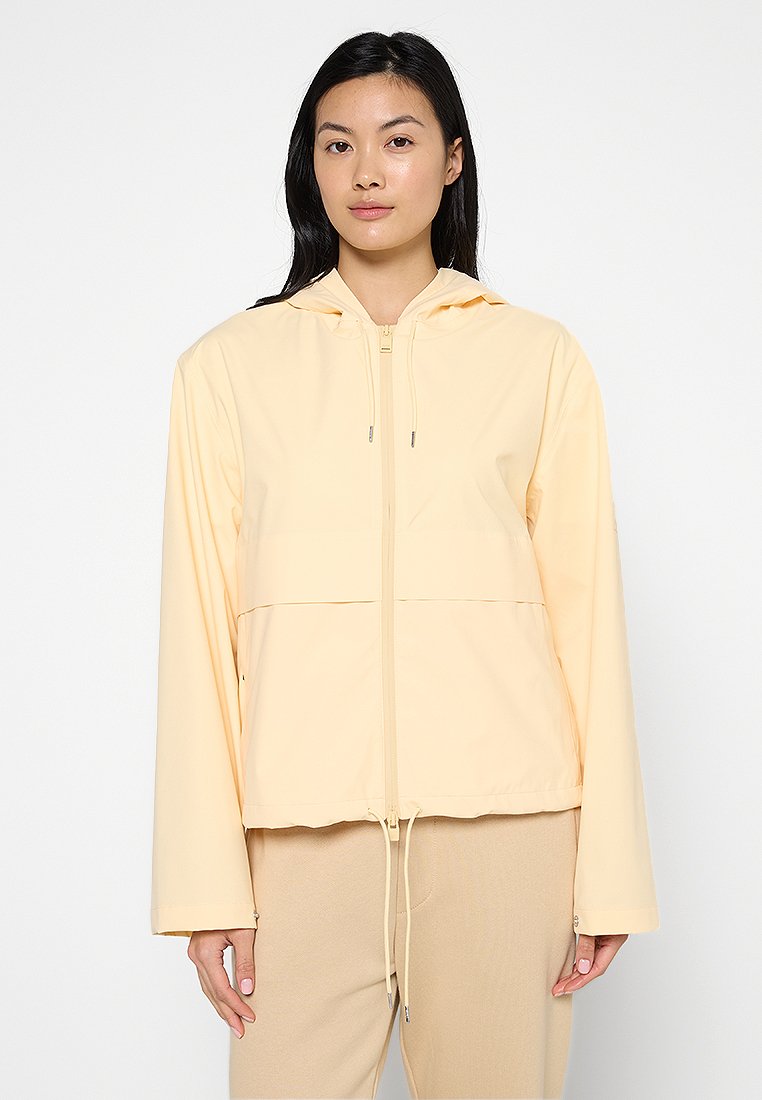 Rains Regenjas lichtgeel