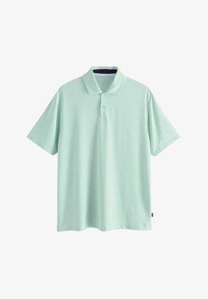 Mintroheline lühikeste varrukatega polo-särk tekstuurse kangaga, millel on klassikaline krae, kolme-nupuline placket ja küljetagi detailid.