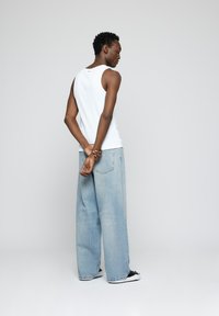 EIGHTYFIVE LOOSE BAGGY - Vaqueros baggy - light wash blue