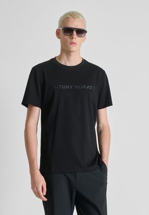 REGULAR FIT - T-shirt con stampa - black