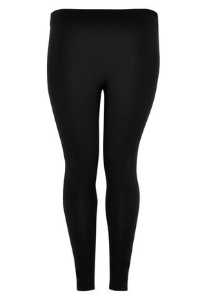 Black leggings with a smooth, stretchy fabric. Features a high waistband and a fitted silhouette, providing full-length coverage.