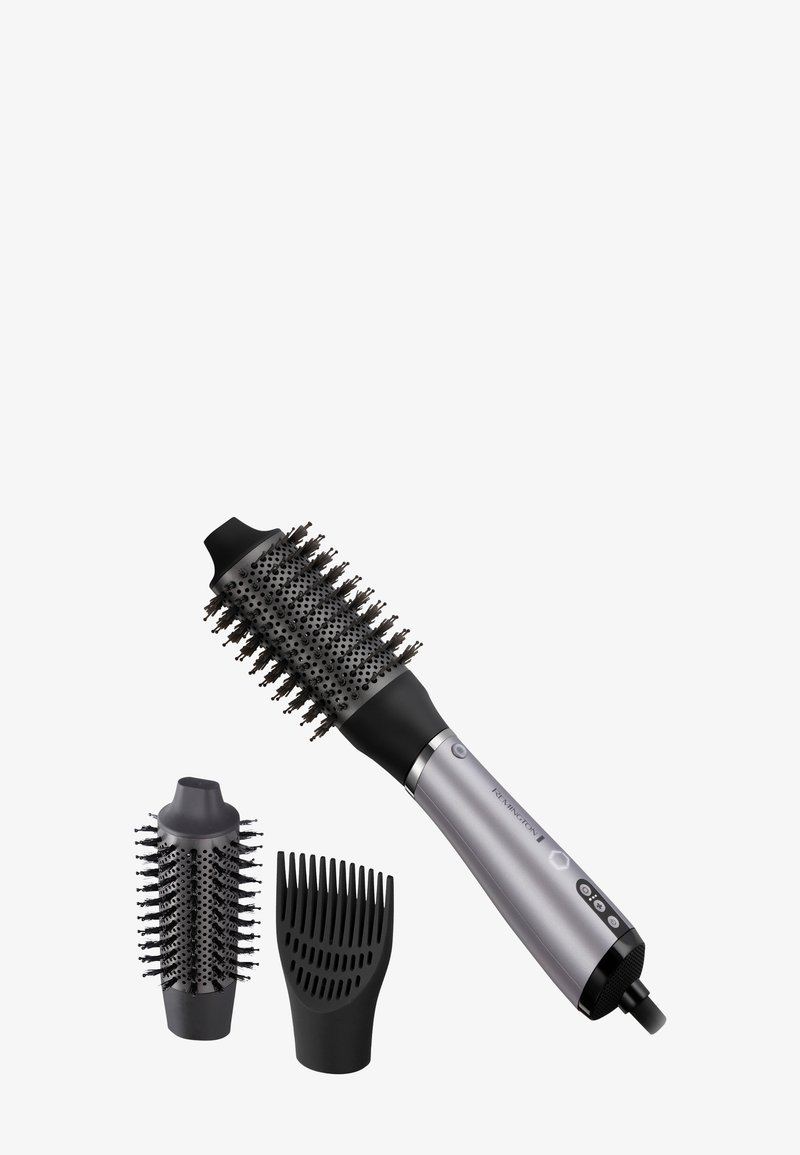 Spazzola per capelli elettrica con manico argento e cilindro nero rotondo, dotata di setole in gomma. Include due teste di attacco staccabili.