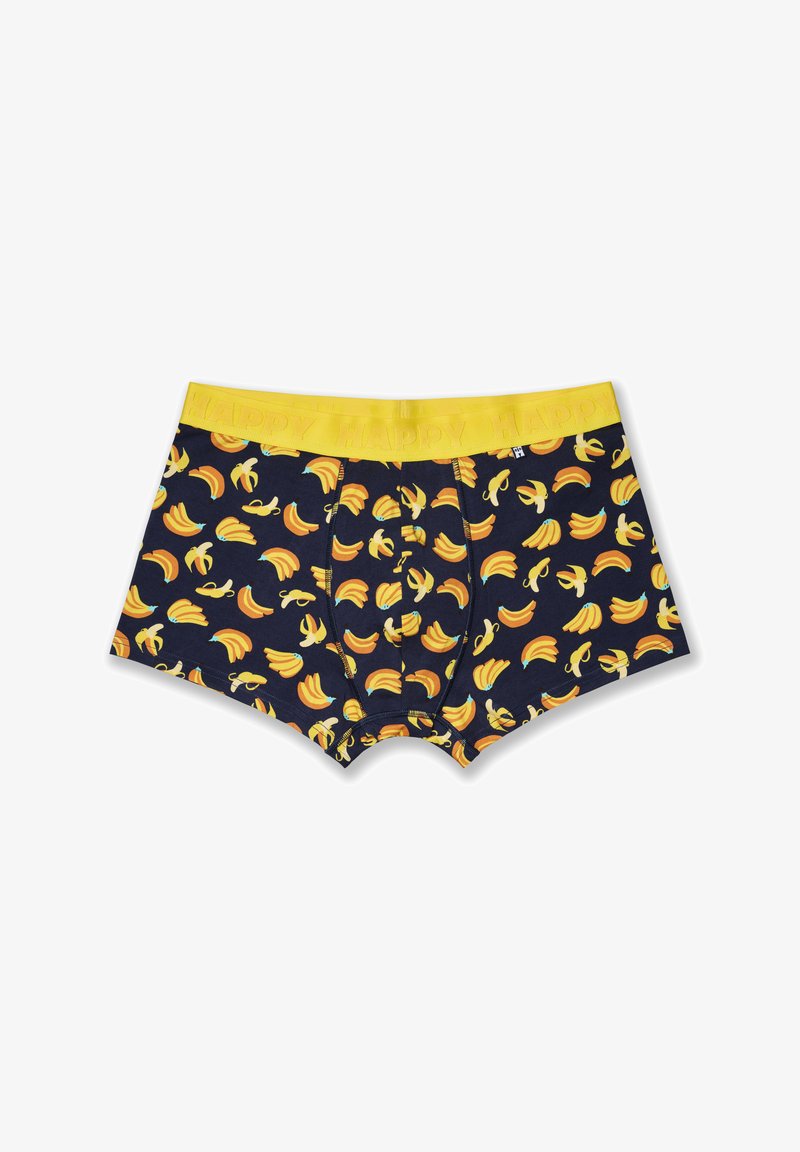 Men's boxer briefs in navy blue fabric featuring a banana pattern. Yellow elastic waistband with "HAPPY" text. Smooth texture and fitted shape.