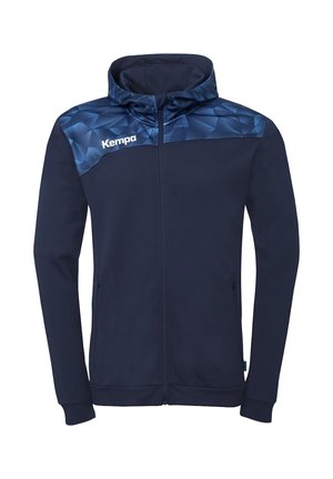 Sweat à capuche zippé bleu marine avec un yoke à motif géométrique en nuances de bleu et le logo "Kempa" sur le côté gauche de la poitrine.
