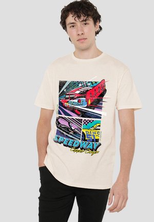 Beige cotton t-shirt featuring colorful retro car graphics, including text elements, with a relaxed fit and short sleeves.