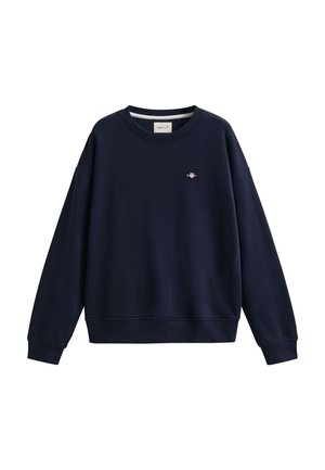 Μπλε ναυτικό φούτερ με μακριά μανίκια και στρογγυλή λαιμόκοψη, με μικρό κεντημένο λογότυπο στο αριστερό μέρος του στήθους και ριμπ μανσέτες και τελείωμα.