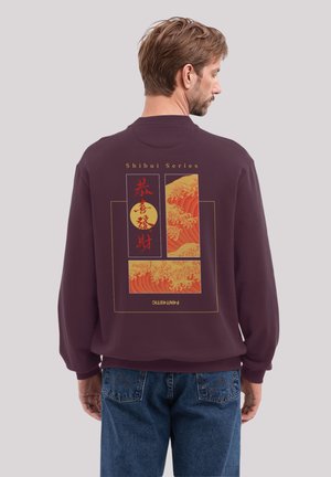 Bordeauxrotes Sweatshirt mit Rundhalsausschnitt, das ein farbenfrohes japanisches Wellenmotiv und Text auf dem Rücken zeigt. Legere Passform mit gerippten Bündchen.