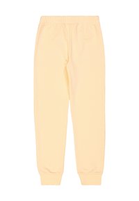 Geel katoenen joggers met een elastische tailleband, slim fit en geribbelde boorden. Soepele textuur zonder zichtbare patronen of accenten.