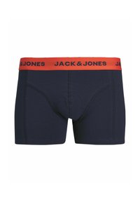 Marineblaue Boxershorts aus weichem Stoff. Mit einem roten elastischen Bund, auf dem "JACK & JONES" in Schwarz gedruckt ist. Aerodynamisches Design.
