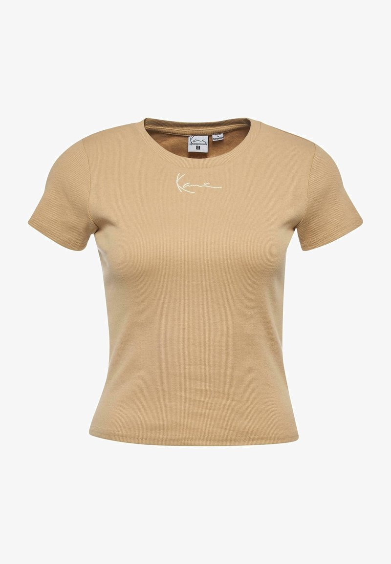 Tan cotton t-shirt with short sleeves, ribbed texture, and a fitted design. Features white embroidered signature on the chest.