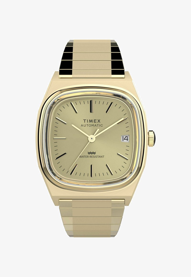 Guldfarvet Timex automatisk ur med firkantet urkasse, minimalistisk beige urskive, dato-display og vandafvisende funktion; metal link-armbånd.