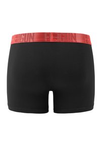 Black boxer shorts with a red elastic waistband featuring repeated branding. Smooth texture with a fitted shape and short leg design.
