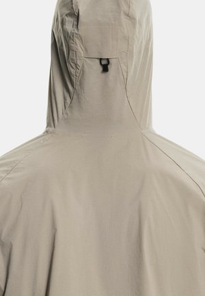 Béžová kapucňová bunda s texturovaným povrchem, se stahovací šňůrkou u krku a kapsou na zadní straně pro uložení.