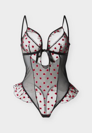 Fekete áttetsző teddy fehérnemű piros szívmintákkal, állítható pántokkal, elöl megkötős, kulcslyuk kivágással és fodros oldalrészekkel.