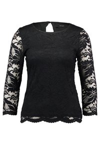 Black lace top with long sleeves featuring floral patterns, scalloped hem, and a small back keyhole opening. Cotton-blend fabric.