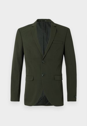 Donkergroene blazer met twee knopen, met sja lapels en een borstzak. Soepele textuur, nauwsluitende pasvorm en subtiele stikseldetails.