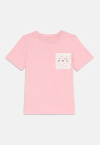 Rosa bomulls t-skjorte med korte ermer og rund hals. Har en hvit lomme med trykt kattansiktsdesign. Myk tekstur.