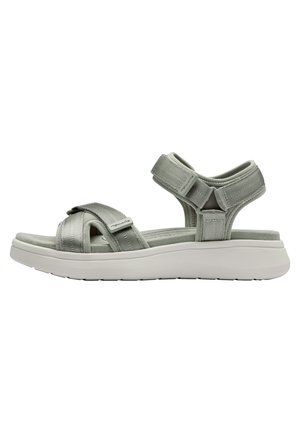 Gray sandal with cross-strap design, textured fabric, adjustable straps, and a thick white rubber sole. Features a cushioned footbed.