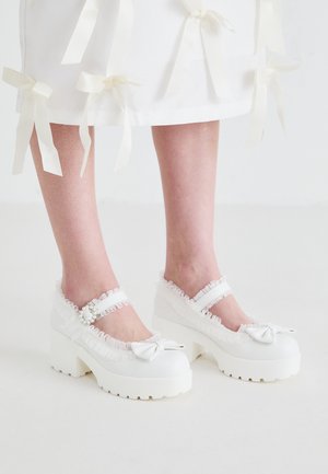 TIRA RUFFLE MARY JANES PORCELAIN DELIGHTS EDITION - Platform magas sarkúk - white