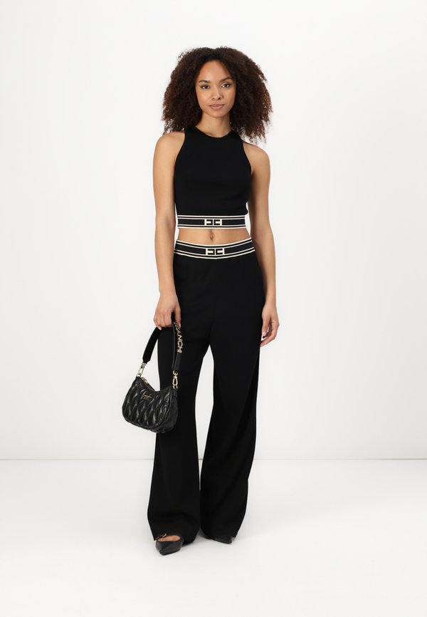 WOMEN PANTS - Trousers4