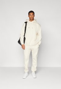 ICANIWILL EVERYDAY SWEATPANTS MEN - Jogginghose - cream