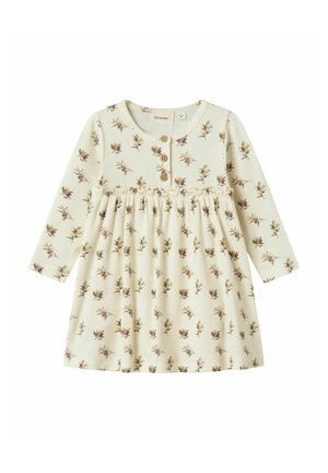 Robe à manches longues couleur crème avec imprimé floral, texture côtelée, fermeture boutonnée au niveau du col et taille froncée.