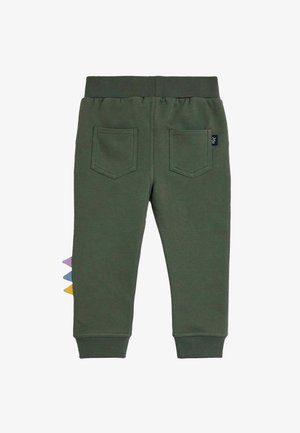 Grüne Baumwoll-Sweatpants mit elastischem Bund, zwei Gesäßtaschen und bunten dreieckigen Stoffakzenten an der Seite.