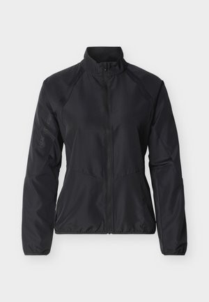 Must kerge lukuga jope pikkade varrukatega, kõrge kraega ja õlgadel ning küünarnukkidel peened võrgust detailid.