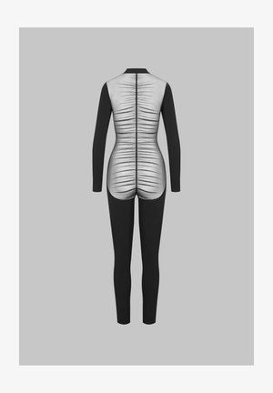 Combinaison noire intégrale avec un dos texturé blanc contrastant, dotée de plis verticaux et de manches longues. Design ajusté offrant une couverture complète.