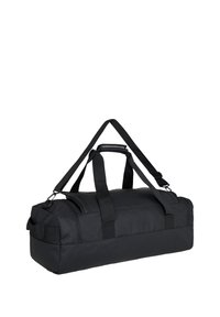 Czarna torba sportowa wykonana z trwałego materiału, wyposażona w solidne podwójne uchwyty, regulowany pasek na ramię oraz gładkie zamknięcie na zamek błyskawiczny.